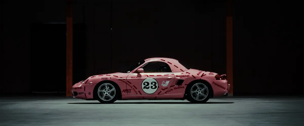 Side profile of the #23 Boxster showing the dashed butcher-chart lines and panel labels
